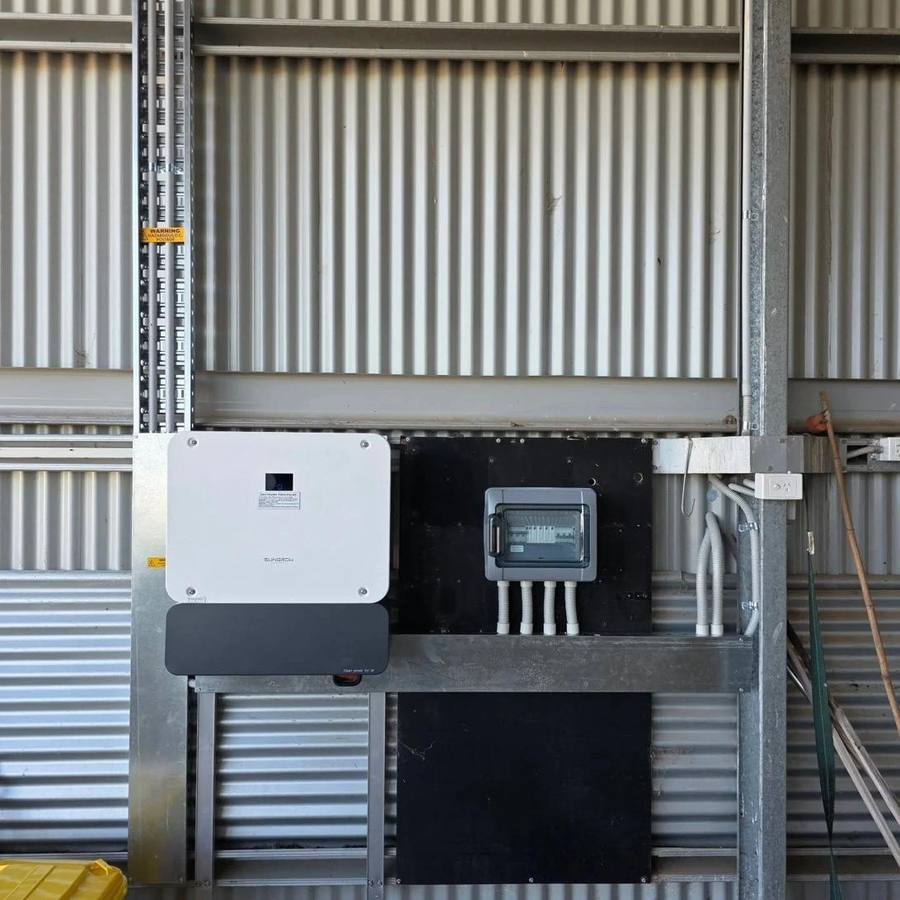 Shed-mounted inverter — Sungrow inverter · farm shed — Rising Sun Electrical